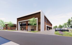 Nieuwbouw bedrijfspand in Dieren met strakke gevel en overheaddeur, nabij Arnhem.