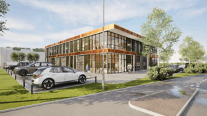 Nieuwbouw bedrijfspand in Dieren met strakke gevel en overheaddeur, nabij Arnhem.